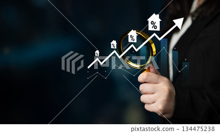 Business Person Holding Magnifying Glass with Growing Graph and Percent Symbols, Analyzing Market Trends and Opportunities in Finance Sector Gantry Business Person Holding Magnifying Glass with Growing Graph and Percent Symbols, Analyzing Market Trends and Opportunities in Finance Sector Gantry 134475238