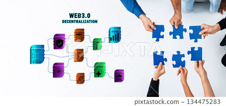 Diverse Hands Working Together to Assemble Puzzle Pieces Representing Concepts of Decentralization and Web3 Technologies in Modern Collaboration Trope 134475283