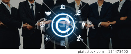 Business Team in Suits with Circular Digital Icons Representing Law, Security, Partnership, and Innovation Against a Neutral Background for Stock Photo Use Trope 134475400