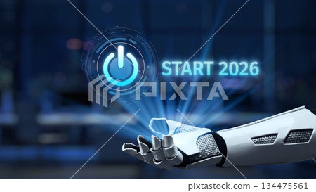 Futuristic robotic hand with holographic interface showcasing a glowing power button symbol and the year 2026 in a high-tech environment for innovation themes Synapse 134475561