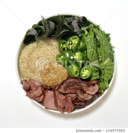 A vibrant poke bowl filled with fresh diced fish, vegetables, and flavorful toppings. Perfect for food photography, this dish embodies the essence of healthy, colorful eating and Hawaiian-inspired. A vibrant poke bowl filled with fresh diced fish, vegetables, and flavorful toppings. Perfect for food photography, this dish embodies the essence of healthy, colorful eating and Hawaiian-inspired. 134475565