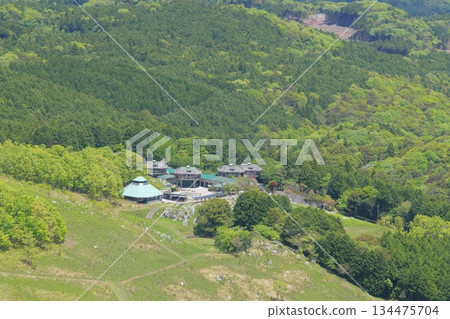 Akiyoshidai Youth Nature House seen from the summit of Kitayama Akiyoshidai Youth Nature House seen from the summit of Kitayama 134475704