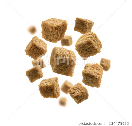 Bread croutons levitate on a white background 134475923