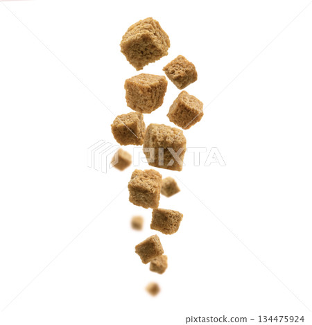 Bread croutons levitate on a white background 134475924