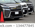 Used car image: Toyota minivans lined up at a dealership 134477845