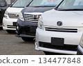 Used car image: Toyota minivans lined up at a dealership 134477848