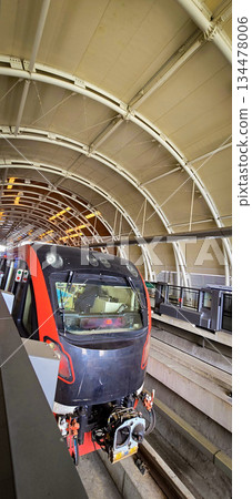 Light Rail Transit or LRT or rail transport system in Indonesia, modern metro train stationed at an urban platform, showcasing efficient public transport Light Rail Transit or LRT or rail transport system in Indonesia, modern metro train stationed at an urban platform, showcasing efficient public transport 134478006