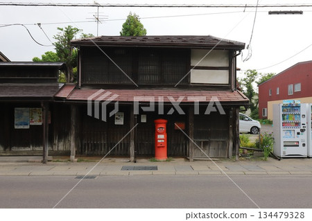 Aomori, Hirosaki, Scenery with a round postbox (in front of the Ishiba family residence) 134479328