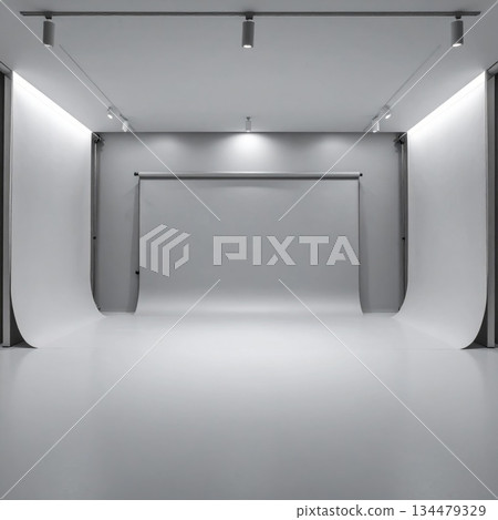 Empty Photography Studio with White Seamless Background and Track Lighting System 134479329