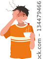 a sick man checking fever with a thermometer while holding a hot drink. flu symptoms and illness concept. 134479466