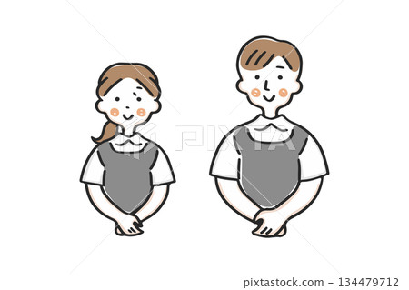 一男一女身穿黑色圍裙，雙手交握於身前。 134479712