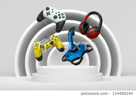 Game controllers, headphones, and joystick floating over podium with abstract background, representing modern gaming equipment 134480244