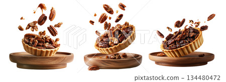 Sweet glazed pecan tart pie with golden crust and caramelized nut topping, isolated on white background, concept of dessert 134480472