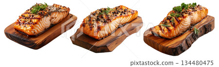 Grilled salmon steak topped with herbs and pepper, served on rustic wood board, isolated on white background, concept of seafood 134480475