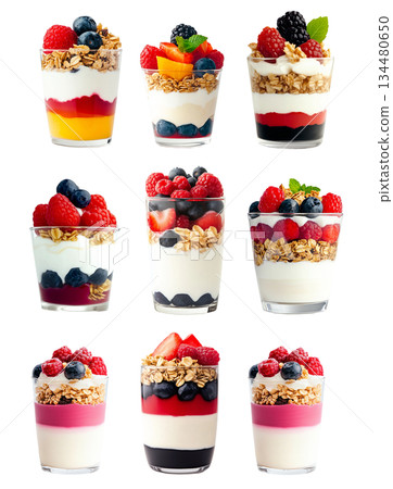 Set of Yogurt parfait with granola, raspberries, blackberries, and mint leaves in glass cup isolated on white background Set of Yogurt parfait with granola, raspberries, blackberries, and mint leaves in glass cup isolated on white background 134480650