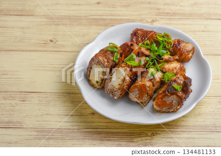 Carrot and deep-fried tofu wrapped in meat Carrot and deep-fried tofu wrapped in meat 134481133