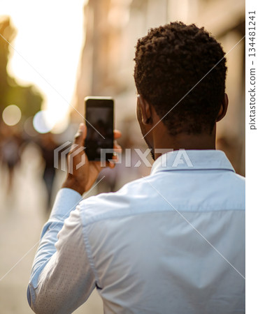 Men shooting with a smartphone 134481241