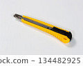 Yellow cutter knife, work cutter, tool, white background 134482925