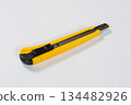Yellow cutter knife, work cutter, tool, white background 134482926