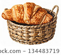 Golden Croissant in Woven Basket Isolated on White Background Studio Lighting 134483719