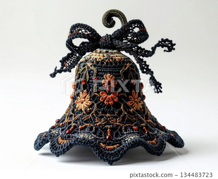 Ornate Black and Copper Beaded Bell Decoration with Bow on White Backdrop 134483723