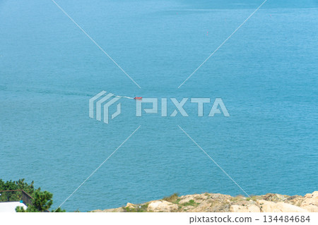 red boat on the sea 134484684