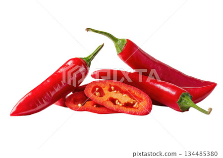Whole and sliced red chili peppers isolated on white background, showcasing vibrant colors and textures, perfect for culinary and food-related concepts. Isolated on transparent background 134485380
