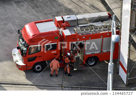 A fire department rescue vehicle maintenance worker 134485727