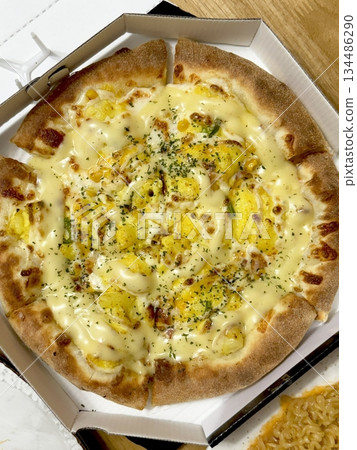 A delicious pizza with a golden crust, melted cheese, and savory toppings. Perfect for food-related designs, menus, or Italian-themed projects, capturing the essence of a classic comfort dish. A delicious pizza with a golden crust, melted cheese, and savory toppings. Perfect for food-related designs, menus, or Italian-themed projects, capturing the essence of a classic comfort dish. 134486290