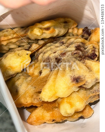 Bungeoppang, bungeo-ppang (Korean Fish Shaped Pastry), popular snack, cookies, sweet in winter streets of Korea. Bungeoppang Korean traditional national food, dish, cuisine. Japanese taiyaki Bungeoppang, bungeo-ppang (Korean Fish Shaped Pastry), popular snack, cookies, sweet in winter streets of Korea. Bungeoppang Korean traditional national food, dish, cuisine. Japanese taiyaki 134486553