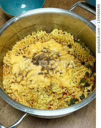 Shin Ramyun,close up of Ramyeon or Ramyun is a Korean-style soup noodle dish with a spicy flavor. Ramyeon or Korean instant noodles with egg - Korean food style 134486640