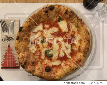 A delicious pizza with a golden crust, melted cheese, and savory toppings. Perfect for food-related designs, menus, or Italian-themed projects, capturing the essence of a classic comfort dish. A delicious pizza with a golden crust, melted cheese, and savory toppings. Perfect for food-related designs, menus, or Italian-themed projects, capturing the essence of a classic comfort dish. 134486759
