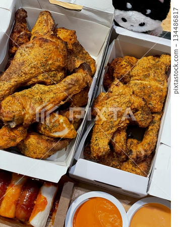 Crispy fried chicken with golden, crunchy skin and juicy, tender meat. A delicious and savory dish, perfect for any meal, served with dipping sauces or side dishes for extra flavor! Crispy fried chicken with golden, crunchy skin and juicy, tender meat. A delicious and savory dish, perfect for any meal, served with dipping sauces or side dishes for extra flavor! 134486817