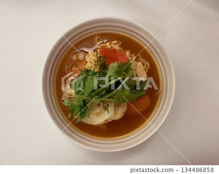 Shin Ramyun,close up of Ramyeon or Ramyun is a Korean-style soup noodle dish with a spicy flavor. Ramyeon or Korean instant noodles with egg - Korean food style 134486858