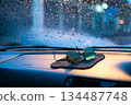 raindrops on car window in car 134487748