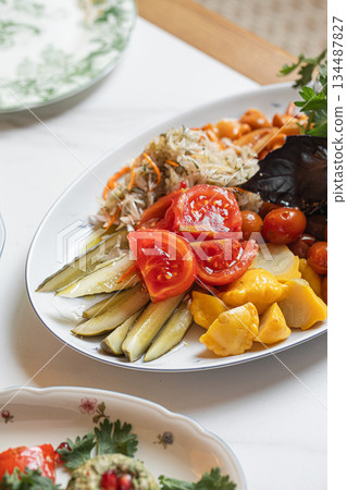 Assorted pickled vegetables salad platter plate 134487827