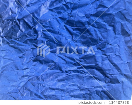 Blue origami paper crumpled and unfolded crease texture background material 31 Blue origami paper crumpled and unfolded crease texture background material 31 134487858