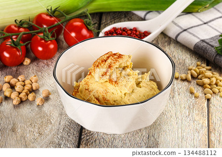 Natural chickpea hummus with paprika 134488112