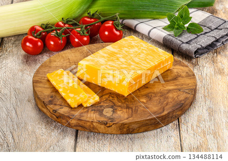 Marble yellow cheese with slices 134488114