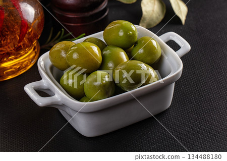 Marinated pickled green olives snack 134488180