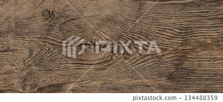 Rustic wood planks revealing textured grain background Rustic wood planks revealing textured grain background 134488359