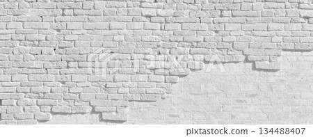White brick wall texture showing distressed peeling paint 134488407