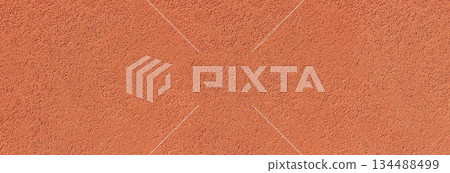 Orange stucco wall rough textured surface background Orange stucco wall rough textured surface background 134488499