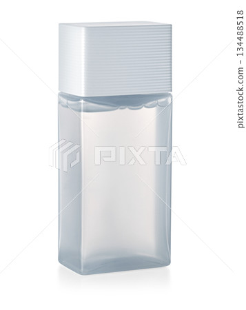 Clear rectangular plastic toiletry bottle with white cap Clear rectangular plastic toiletry bottle with white cap 134488518