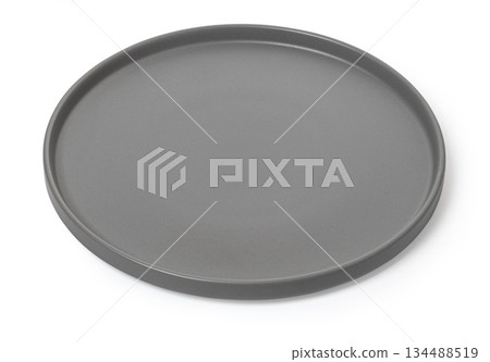 Round nonstick pizza pan baking tray kitchenware isolated Round nonstick pizza pan baking tray kitchenware isolated 134488519