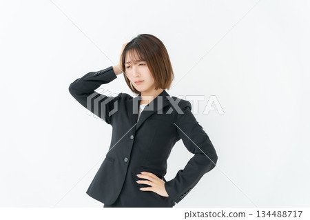 Business woman, young woman, worried Business woman, young woman, worried 134488717