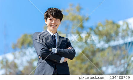 Businessman blue sky Businessman blue sky 134488769