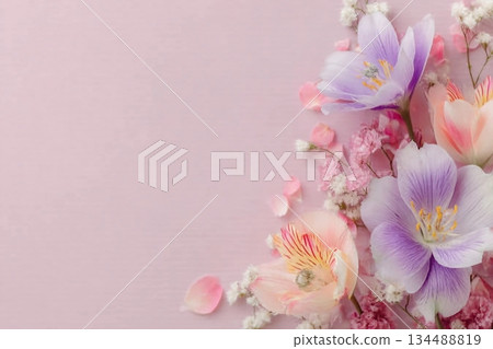 beautiful spring flowers on paper background beautiful spring flowers on paper background 134488819