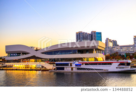 View of the Han River at dusk from a sunset cruise ship View of the Han River at dusk from a sunset cruise ship 134488852