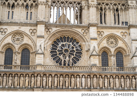 Gothic rose window in Paris France Cathedral of Notre Dame de Paris. Old building French architecture Gothic rose window in Paris France Cathedral of Notre Dame de Paris. Old building French architecture 134488898